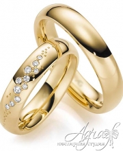 Обручальные кольца из желтого золота с бриллиантами
